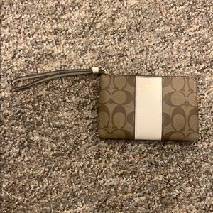 Tan and White coach wristlet